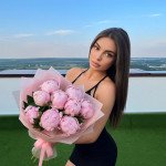 Букет 9 розовых пионов с упаковкой